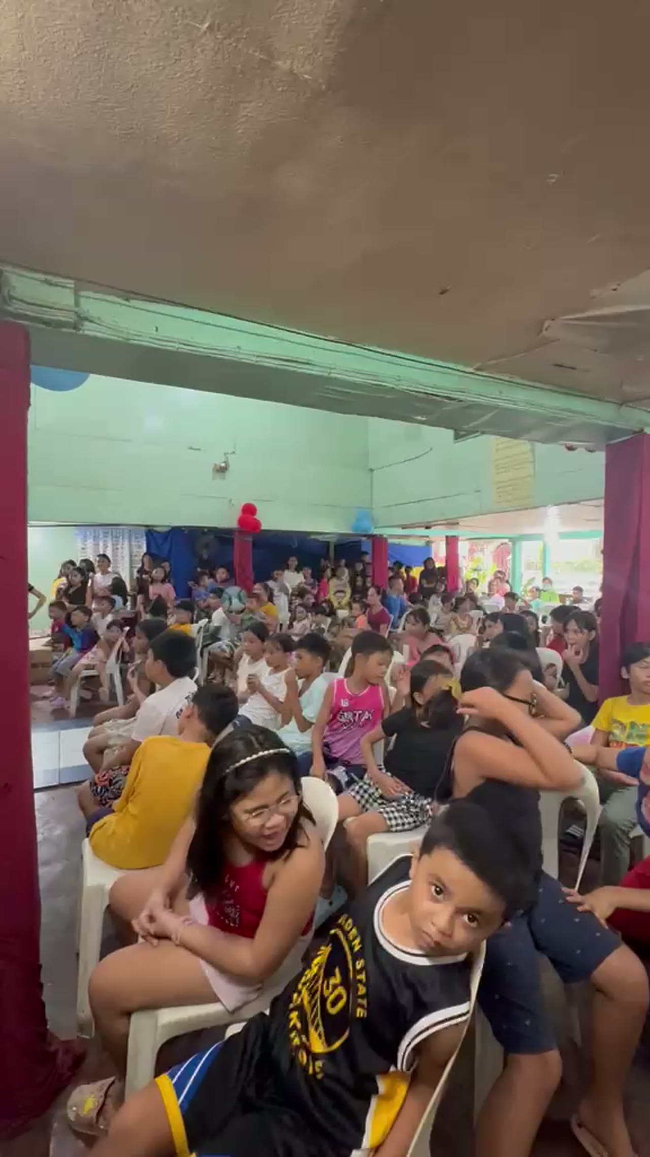 Nizi Bhandari bringing smiles to children in the Philippines